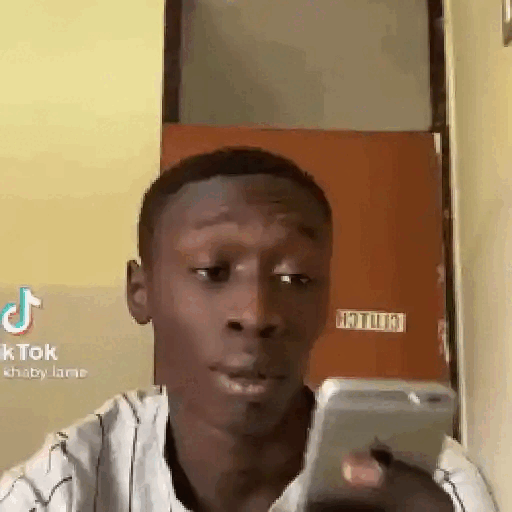 Animated Khaby Lame Confused Phone Reaction GIF Sticker