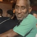 Smiling Man in Green Shirt Sticker