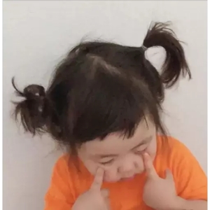 Cute Child with Pigtails