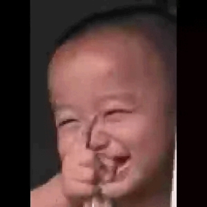 Laughing Baby Thumbs Up