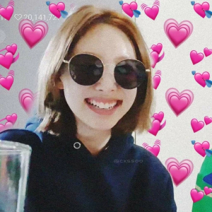 Smiling with Heart Emojis PNG Sticker